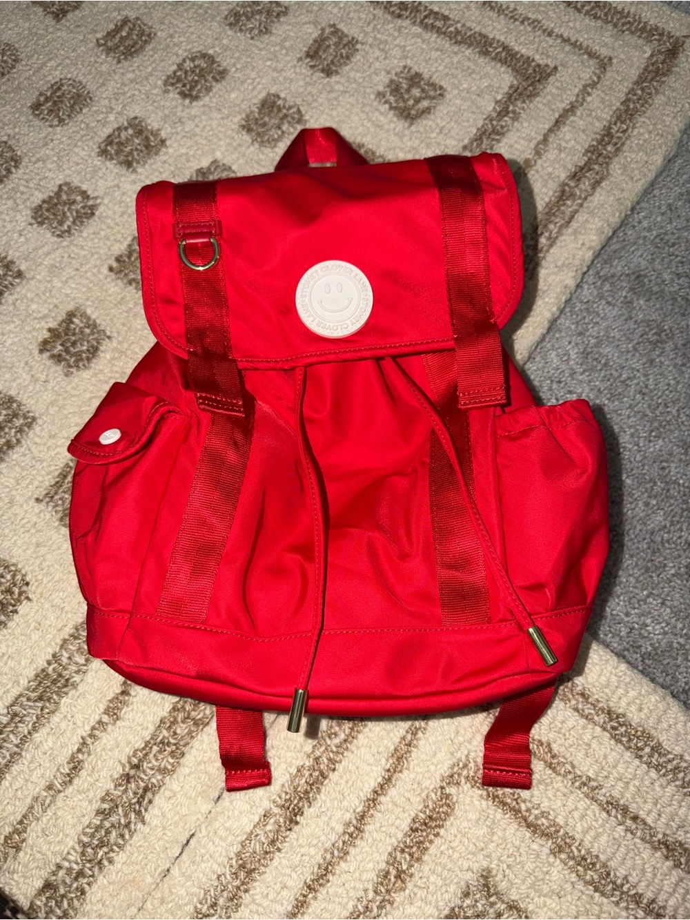 Stony Clover Lane Red Smiley Patch Drawstring Backpack